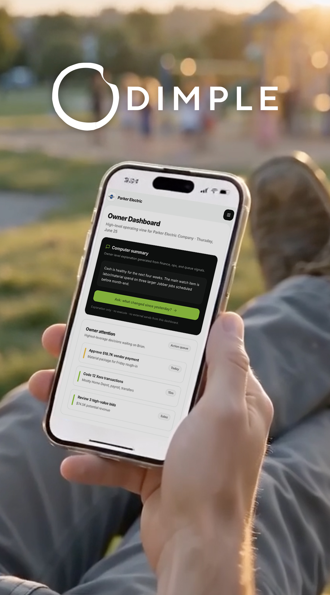 A business owner at the park with the Dimple owner dashboard open on their phone